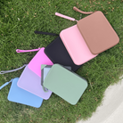 All Colours (Caramel, Blush, Black, Candy Pink, Lilac, Bondi Blue, Sage Green) Strapsicle Clutch Kindle Bag with handle for handheld devices and one sage green kindle strap - Buy Kindle Accessories Direct