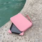 Blush Clutch Bag with handle for handheld device and two blush matching straps made with high grade, silky-soft silicone, companion for a comfy, secure grip that makes reading anywhere drop-free! - Buy Kindle Accessories Direct